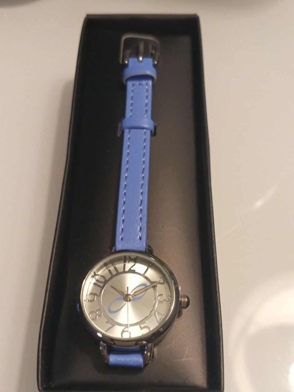 Womens Empowerment Skinny Strap Watch with Light Blue  Strap